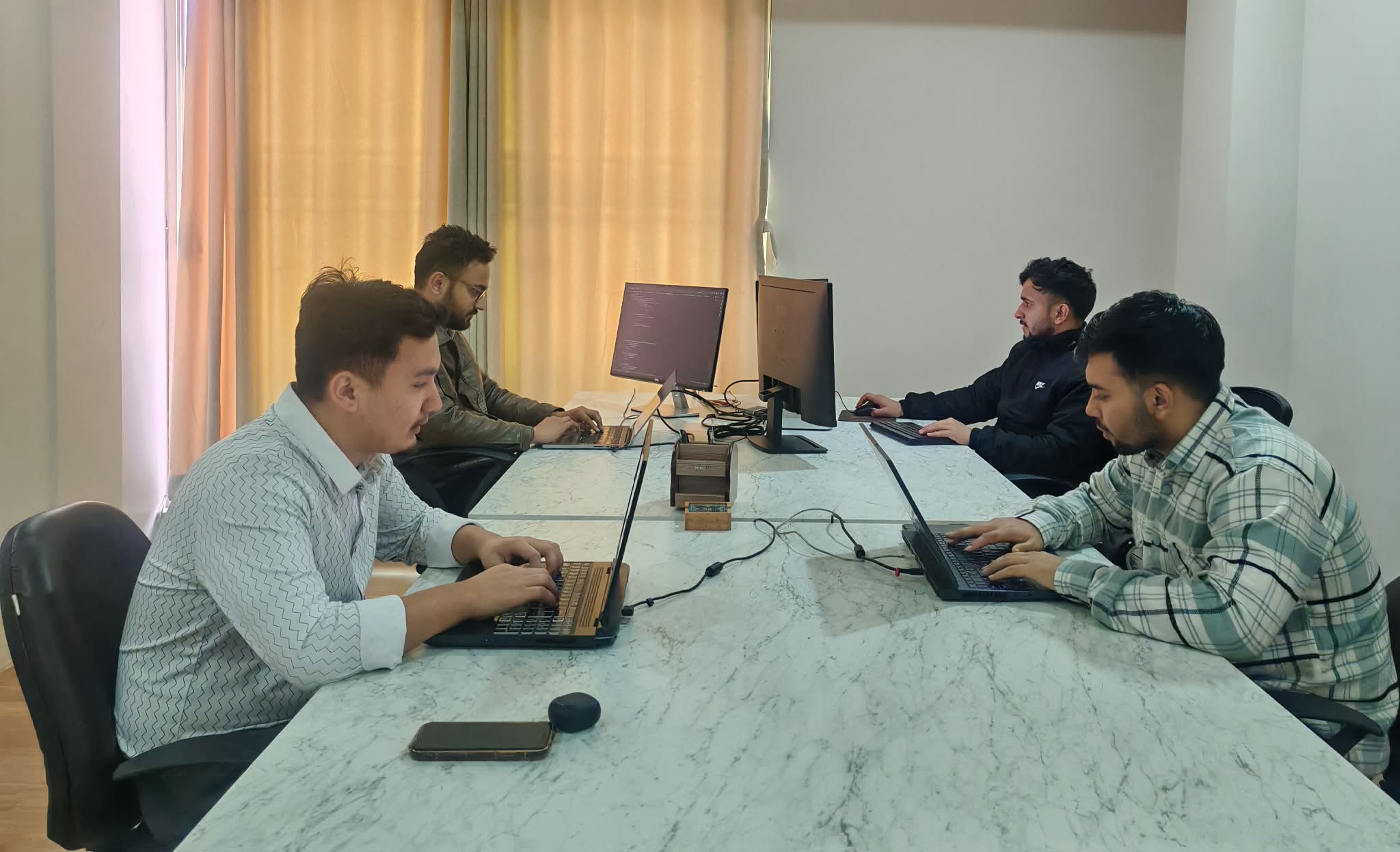 A person intently looking at and interacting with the Saral apps mobile app on a smartphone, demonstrating user engagement and the practical application of Saral Apps solution